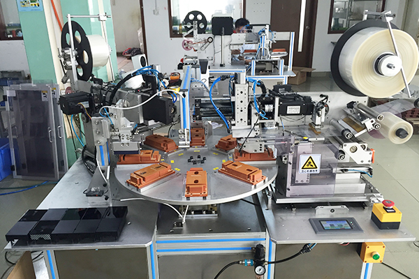 Power adapter shell film machine